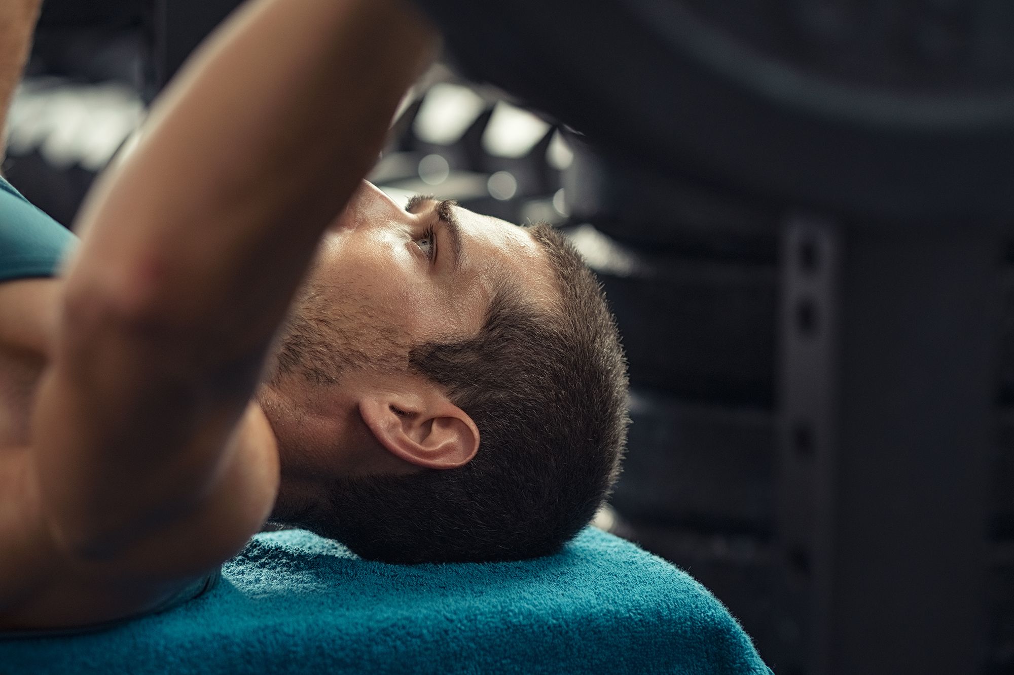 man doing weight lift with barbell